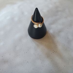12k gold ring.  Silver test was negative.   Small pearls...2.